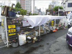 日本一闹市区藏"垃圾山" 市政府束手无策
